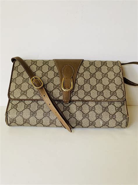 gucci embossed clutch bag|gucci clutch bag vintage.